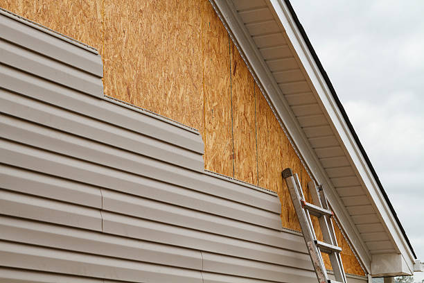 Professional Siding Installation technician working in Yorkville, NY